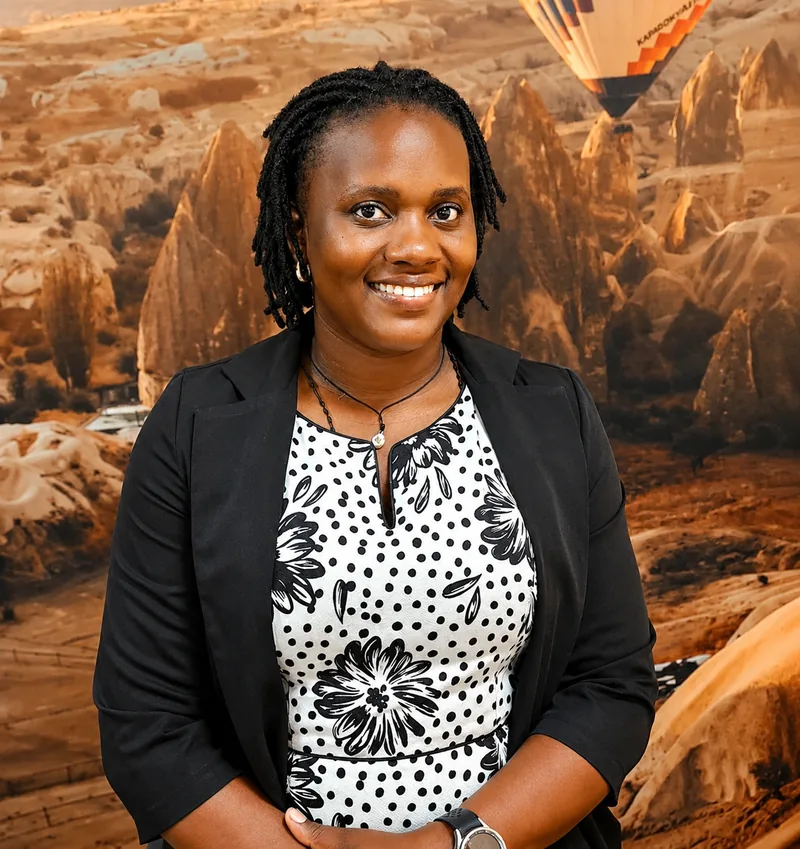 Emilly Karine Ajuna, Head of Programs & Director at WINRISE Counselling & Wellness